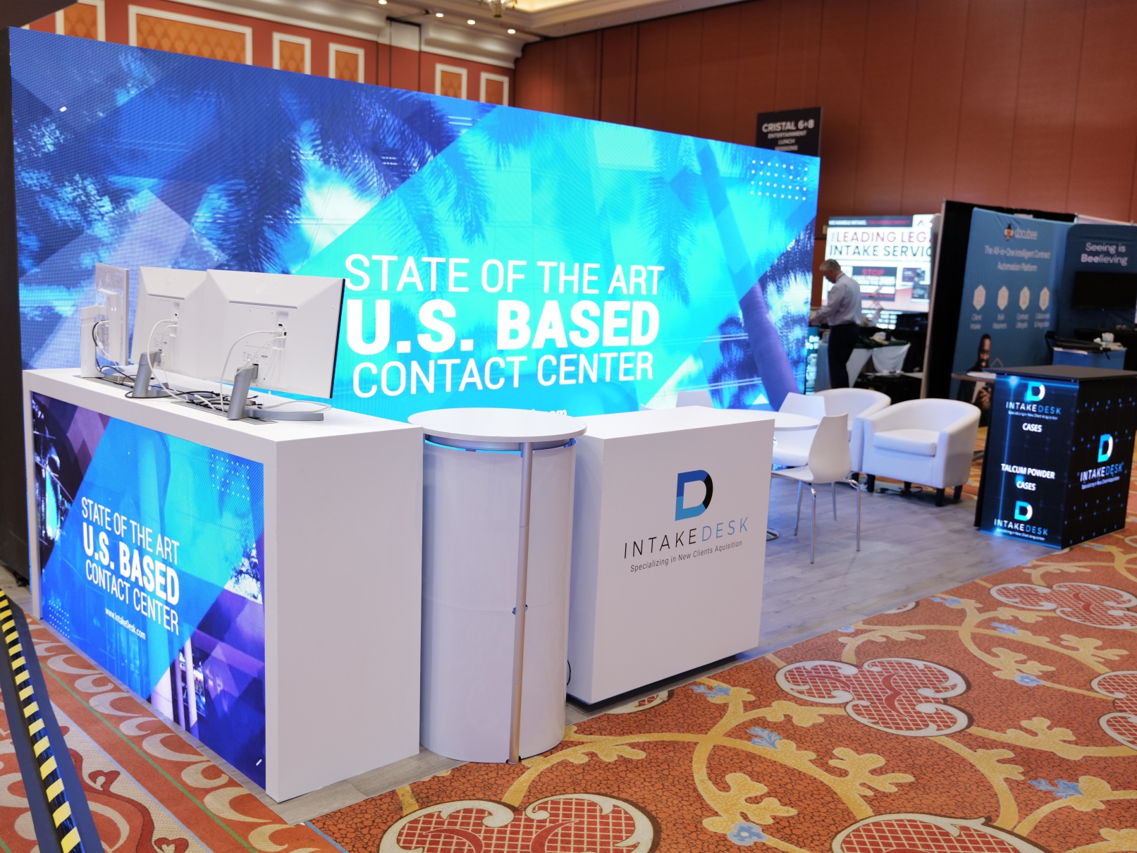 IntakeDesk 10′ x 20′ MTMP 2024 Booth With Video Wall Demo Counter